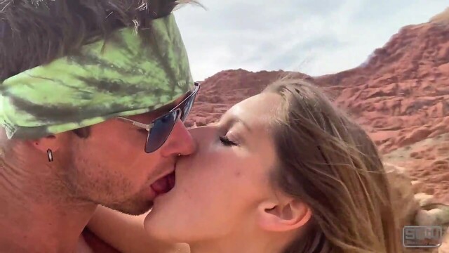 Amateur blonde gives a wild blowjob outside in a public park, showing off